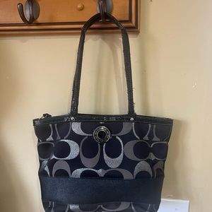 Coach pre-owned shoulder bag. Wear on the straps but still lots of life